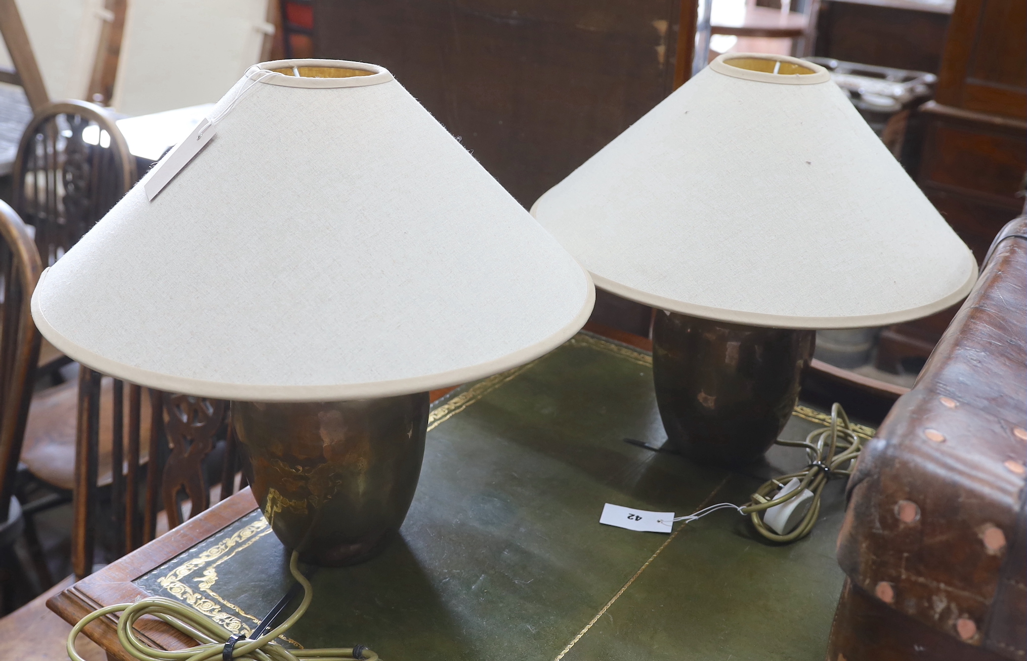 A pair of contemporary copper table lamps, with shades, height including shades 40cm